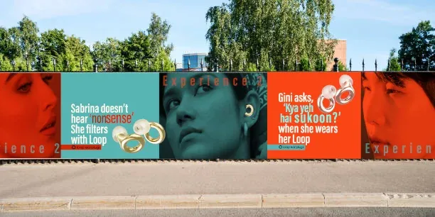 The campaign panels installed along a street hoarding at the festival